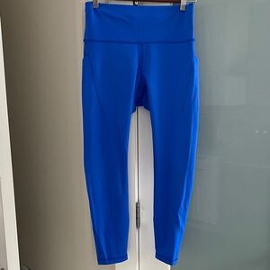 Lululemon Wunder Train High Rise Legging with side pockets, 25” - Size 10